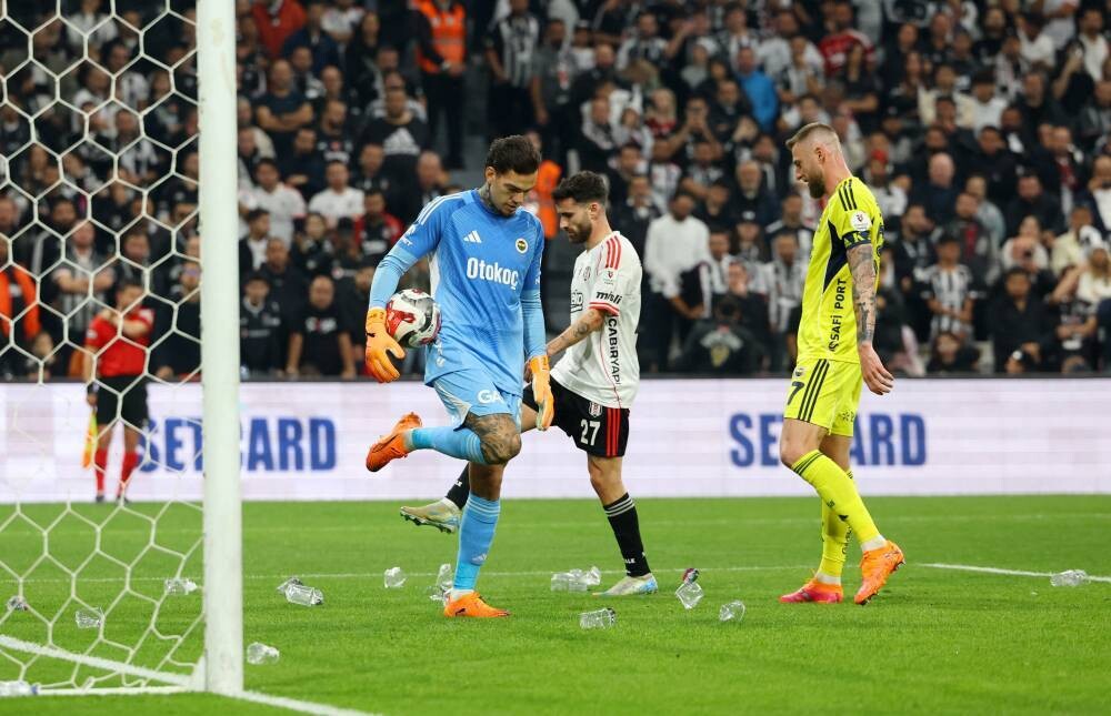 Ederson helps Fenerbahce win derby despite being pelted with cups